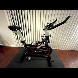 Exercise Bike + Mat (Excellent Condition, Slightly Used)
